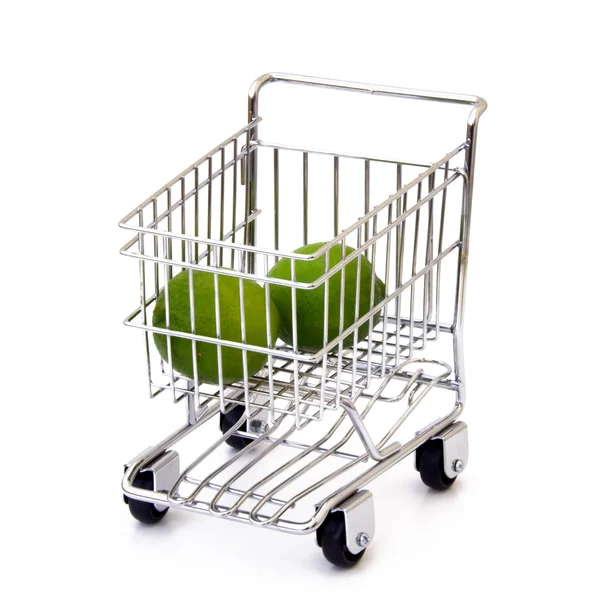 Lime in shopping cart — Stock Photo, Image