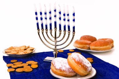 Hanukkah menorah and donuts clipart