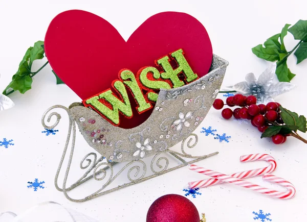 Heart and wish in sledge — Stock Photo, Image