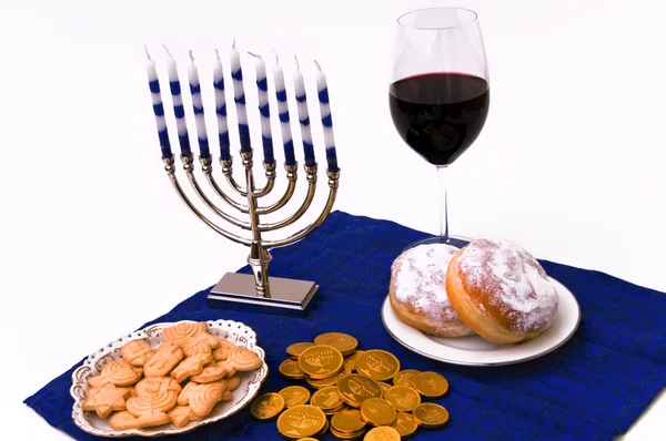 Hanukkah menorah, çörek ve para Stok Resim