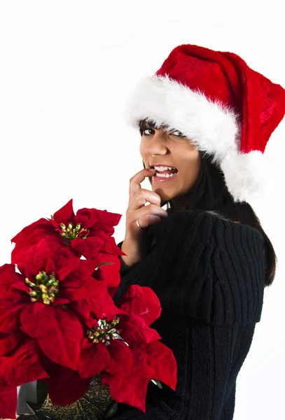 Teen flicka santa med julstjärna blomma — Stockfoto