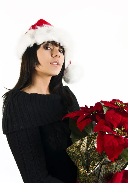 Teen flicka santa med julstjärna blomma — Stockfoto