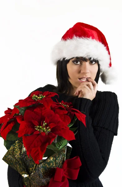 Teen Girl Santa with Poinsettia flower Royalty Free Stock Images