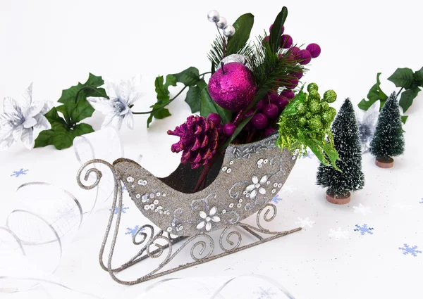 Christmas decoration in sledge — Stock Photo, Image