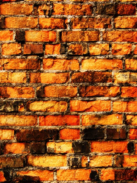 Van een oude bakstenen muur — Stockfoto