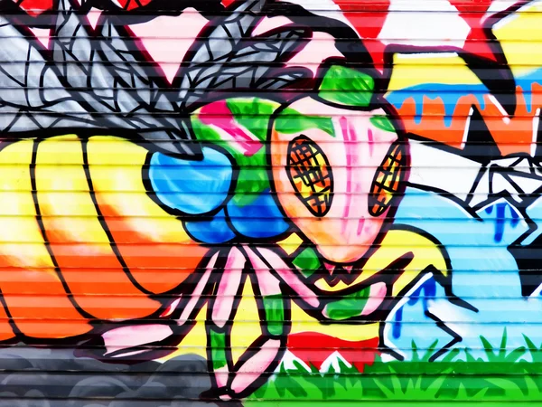 Insete uma libélula desenhada em uma parede de — Fotografia de Stock