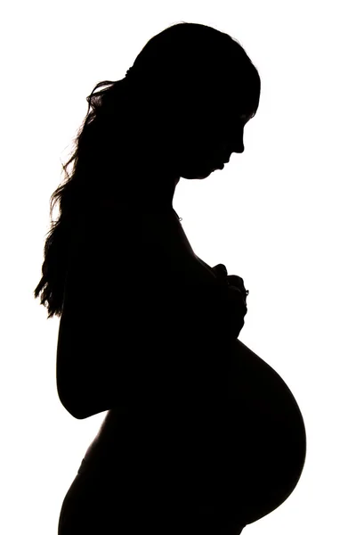 Silhouette of pregnant woman — Stock Photo, Image