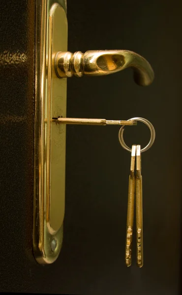 Keys in a keyhole — Stock Photo, Image