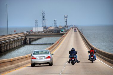 Queue in Lake Pontchartrain Causeway, Ne clipart