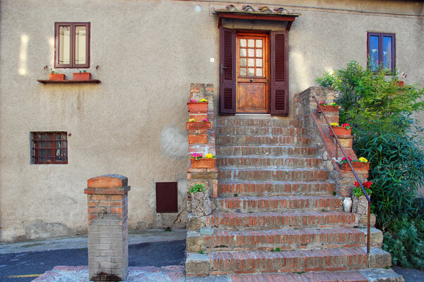 A typical house facade in the small town of Bolgheri
