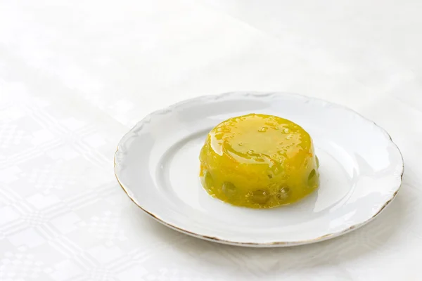 Orange gelatin dessert with grape — Stock Photo, Image
