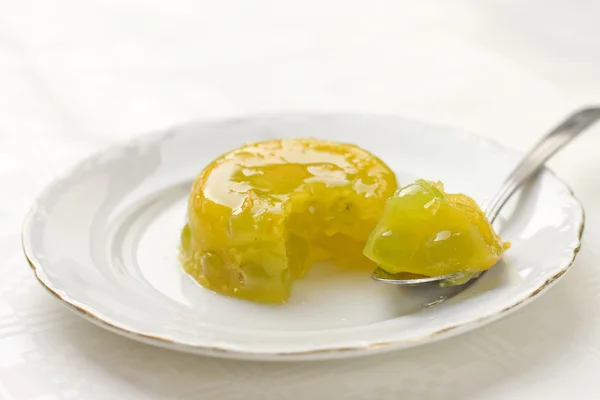 Orange gelatin dessert with grape — Stock Photo, Image