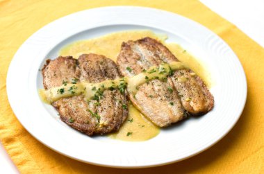 Fried fish in mustard sauce