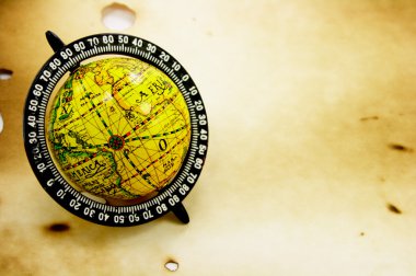 Old globe on grunge background clipart