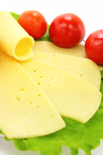 stock image Cheese, tomatoes and lettuce on the plat