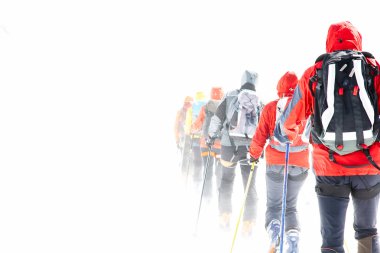 Group touring skiers clipart