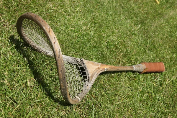 Старая ракетка для бадминтона — стоковое фото