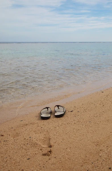 Shoes on sand — Stock Photo, Image