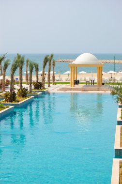 Swiming pool and beach area, UAE clipart