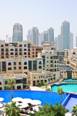 Swimming pool in Dubai downtown, UAE clipart