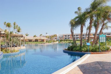 Swimming pool area at VIP villas clipart