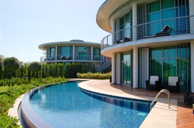 Modern villas at turkish resort clipart