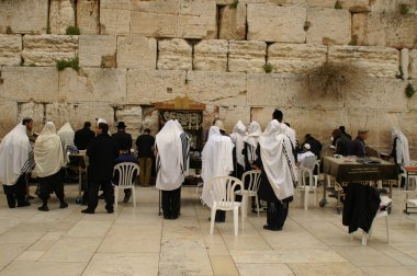 Jewish prayers near wailing wall clipart