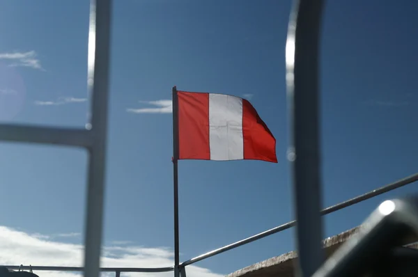 stock image Peru flag on Titicaca lake