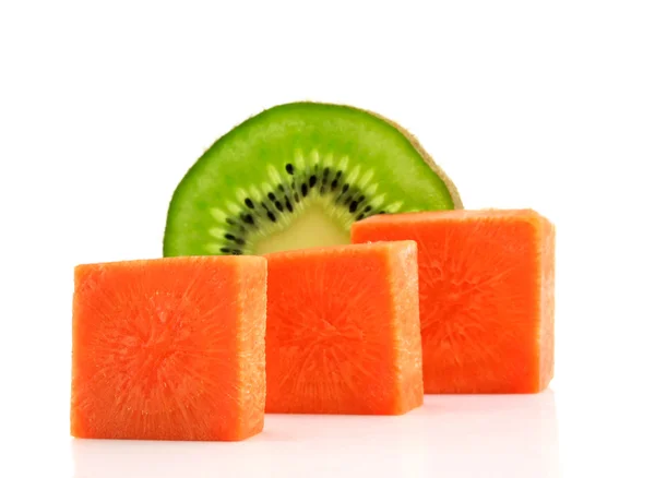 Carrot bricks and kiwi lobule isolated — Stock Photo, Image