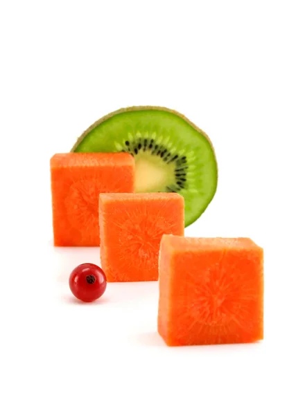 Carrot bricks and kiwi lobule isolated — Stock Photo, Image