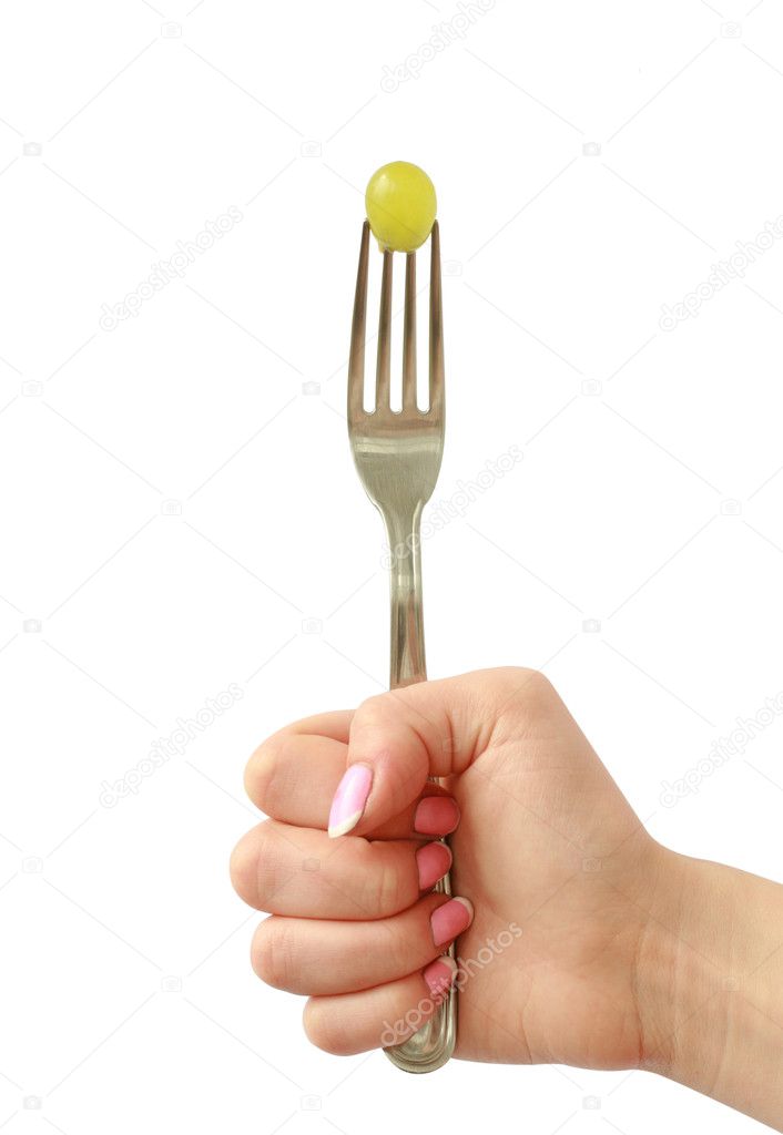 Woman hand with a fork