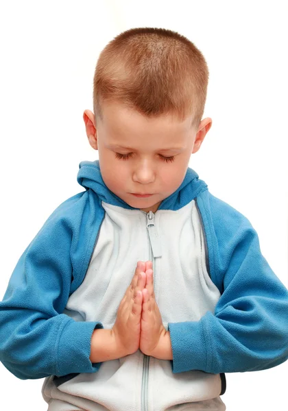 Mały chłopiec modląc się — Zdjęcie stockowe