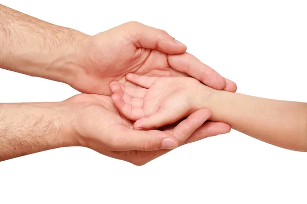 La mano de un niño en la mano de un adulto — Foto de Stock
