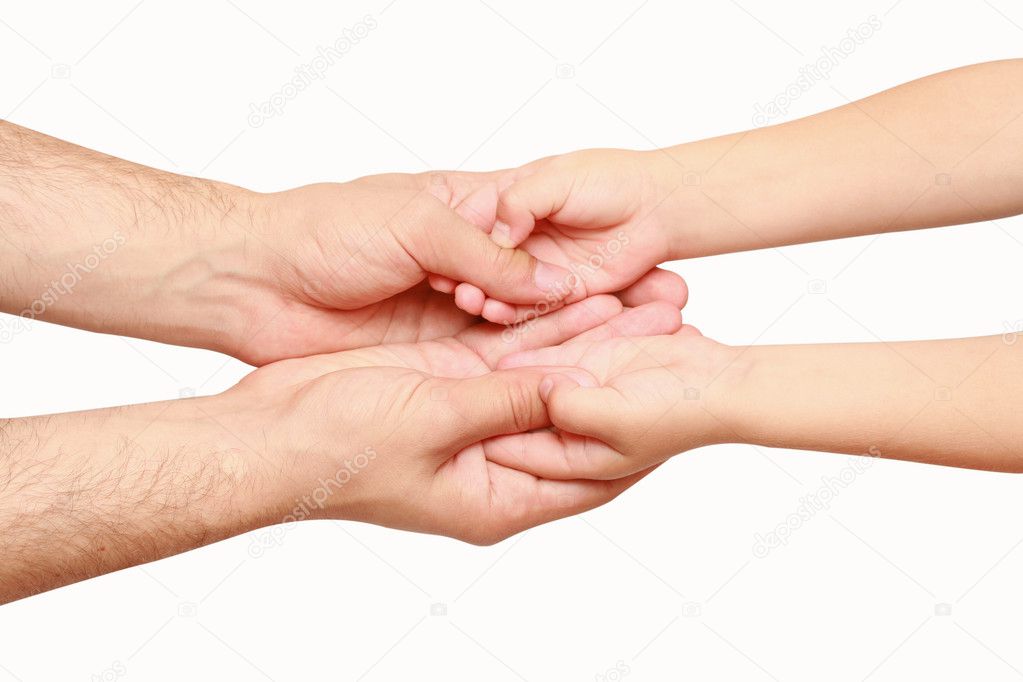 Hands of child in hands of adult