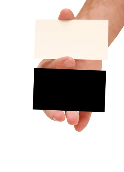 Две визитки в руке — стоковое фото