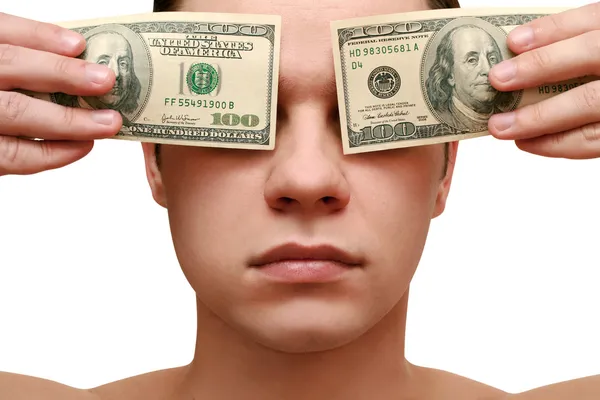 Man closes his eyes with money — Stock Photo, Image