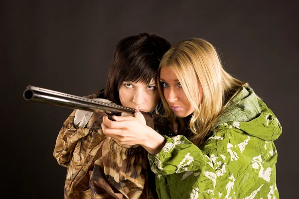 Two woman with gun — Stock Photo, Image