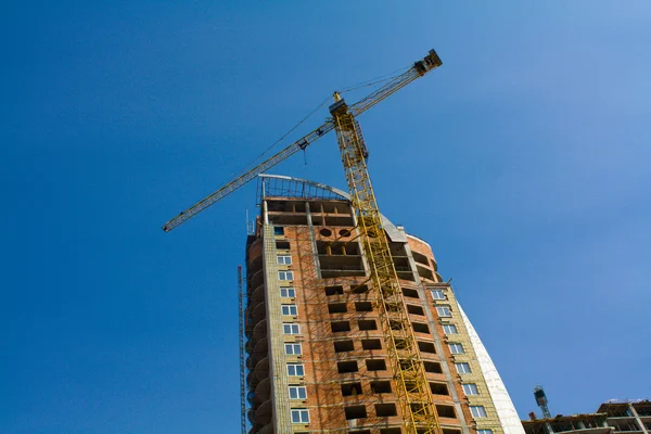 stock image Construction site with big yellow cranes