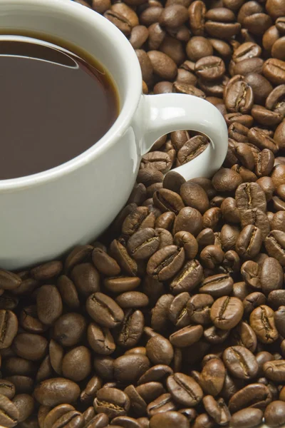 Black coffee and beans — Stock Photo, Image