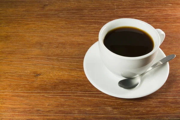 Coffeecup con mesa de madera —  Fotos de Stock