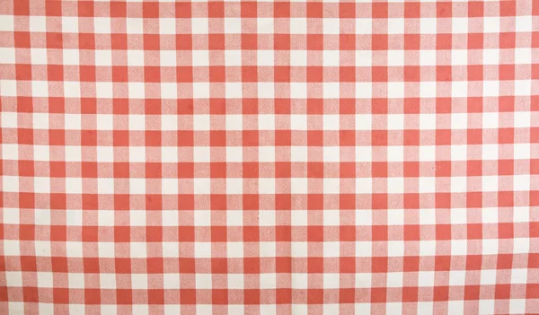 Piros-fehér tarkán szőtt pamutszövet mintás asztalterítő — Stock Fotó