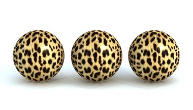 Three balls in a leopard-skin clipart