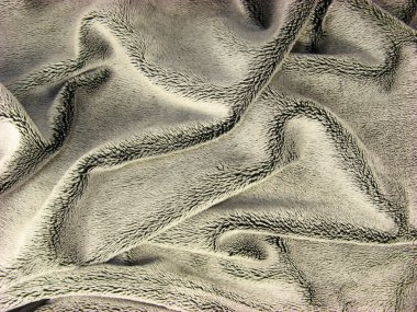 Wrinkled shiny black fur coat fabric clipart