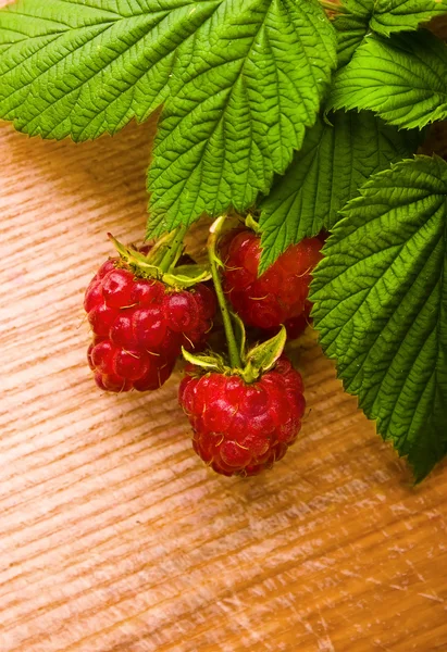 Raspberry on wooden background — Stock Photo, Image