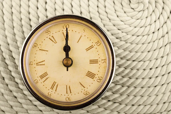 Stock image Clock with Roman numerals on cord