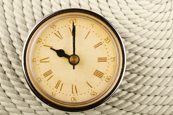 Stock image Clock with Roman numerals on cord