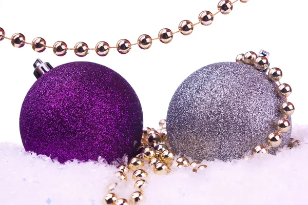 Christmas balls with snow and decoration — Stock Photo, Image