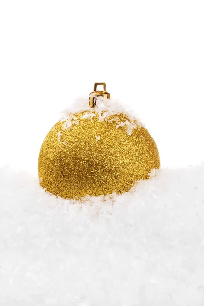 Yellow Christmas ball with snow — Stock Photo, Image