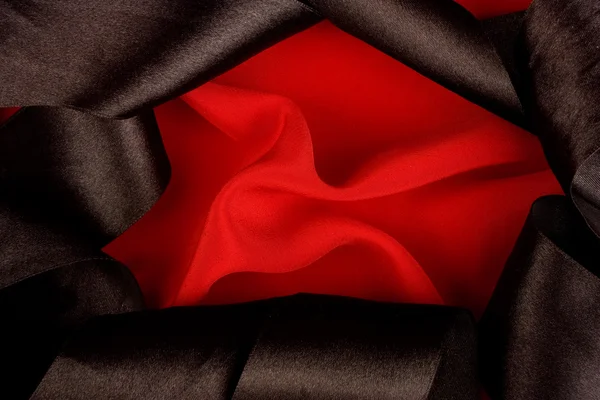 Rote und schwarze Seide — Stockfoto