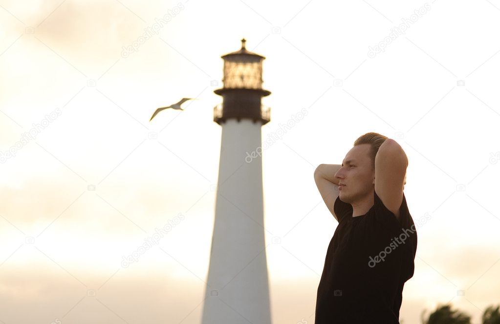 Man and lighthouse